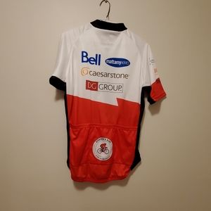 ATAC Sports cycling shirt with a partial zipper at front. Pockets at the back.